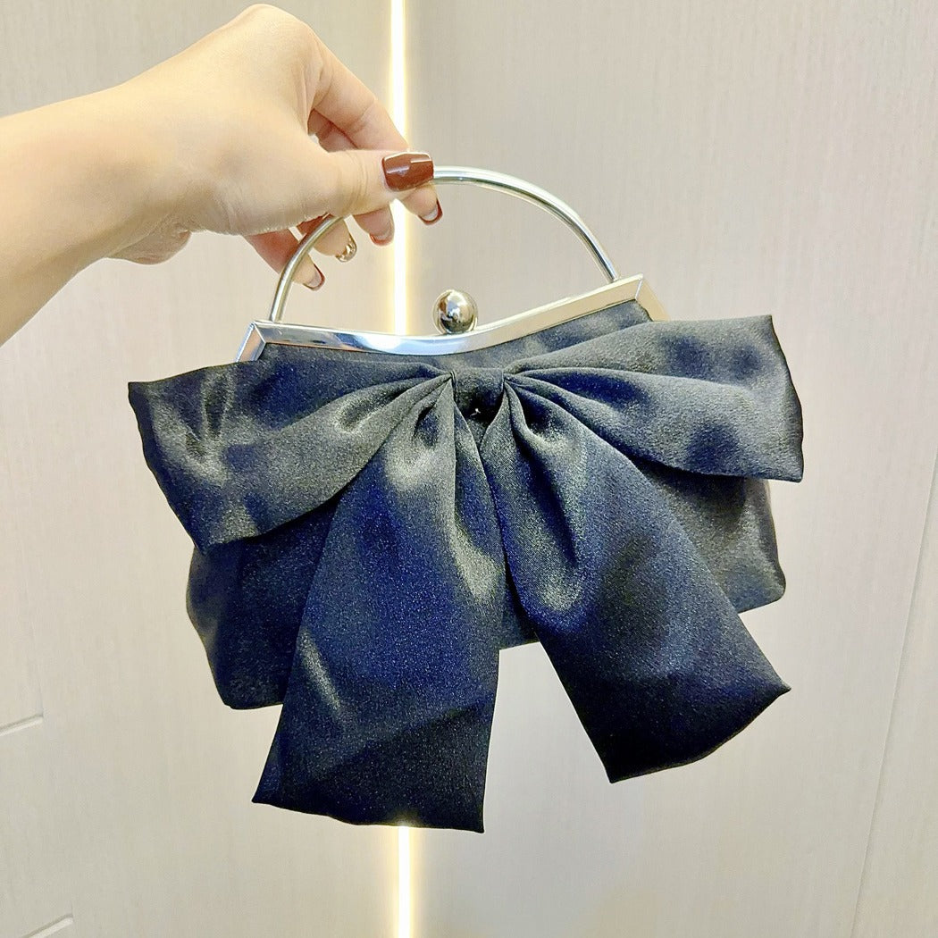Elegant White Bow Handbag with Metal Handle for Wedding and Evening Events, Soft Satin Design with Inner Pockets