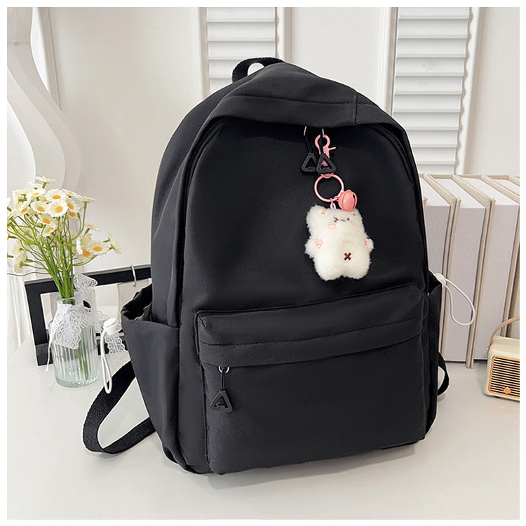 Stylish High-Capacity Backpack for Teen Girls, Japanese Casual Design with Cute Plush Charm and Durable Nylon Material
