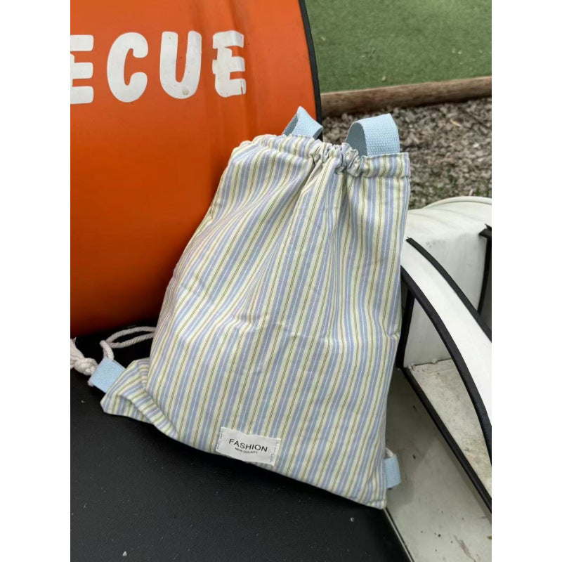 Canvas casual backpack for women, new drawstring striped large capacity shoulder bag