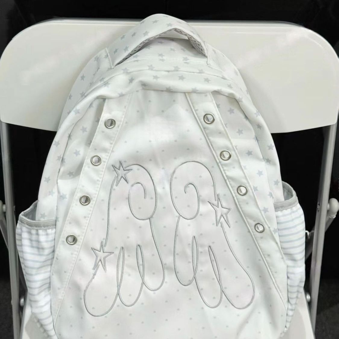 Cute Star Pattern Wings Backpack with Waterproof Design for Students and Daily Use