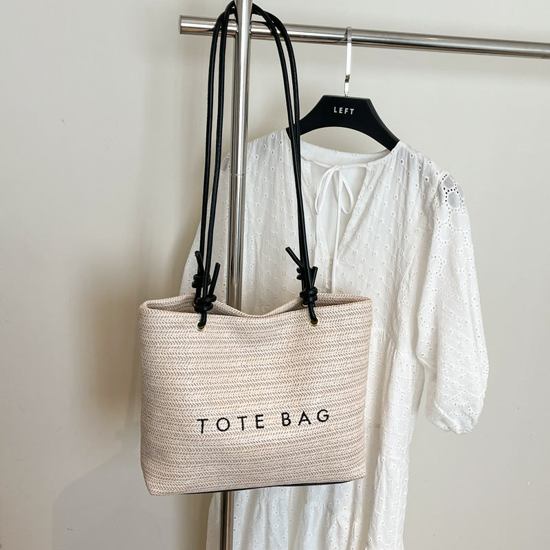 Stylish Straw Tote Bag with Leather Handles for Beach, Travel and Daily Use
