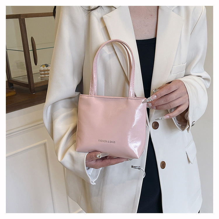 Minimalist Elegant Tote Bag for Women 2025 New Fashion Simple Solid Color Handbag with Magnetic Closure and Stitching Details