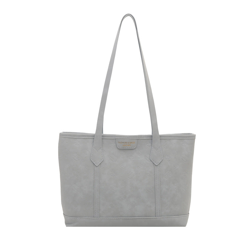 Chic Embossed Tote Bag for Women with Fashionable Monogram Pattern and Spacious Design Perfect for Daily Commute and Casual Outings