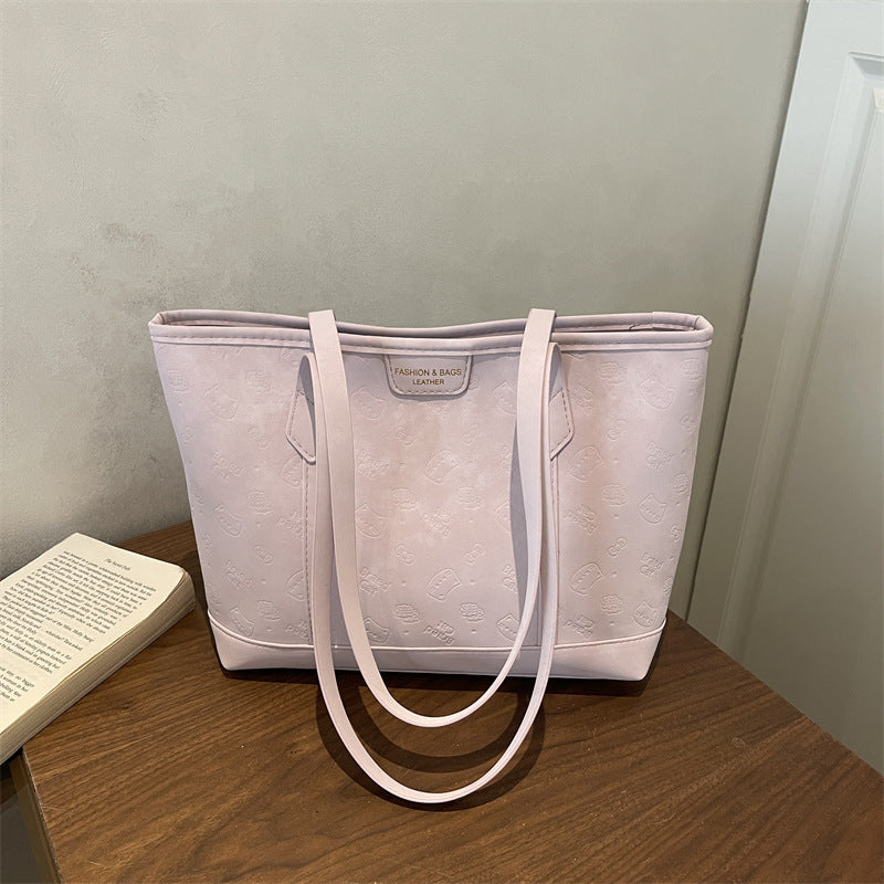 Chic Embossed Tote Bag for Women with Fashionable Monogram Pattern and Spacious Design Perfect for Daily Commute and Casual Outings