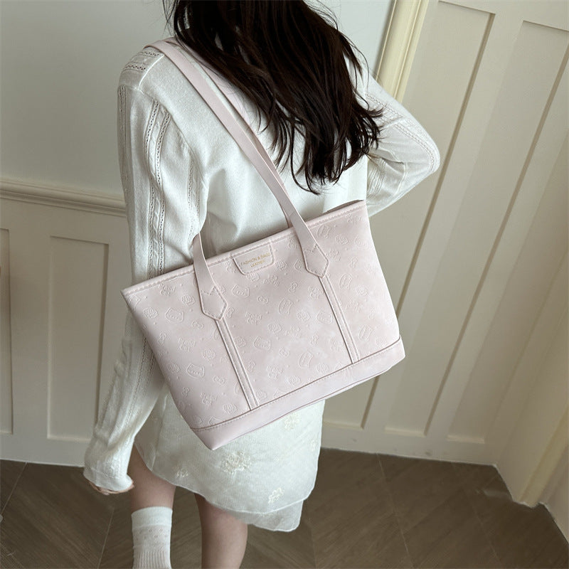 Chic Embossed Tote Bag for Women with Fashionable Monogram Pattern and Spacious Design Perfect for Daily Commute and Casual Outings