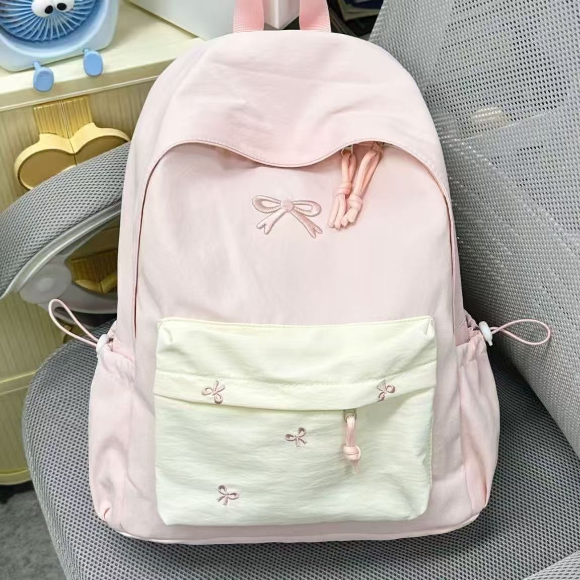 Cute Bow Embroidery Backpack for Students and Travel - Waterproof, Large Capacity, Lightweight Design with Stylish Front Pocket