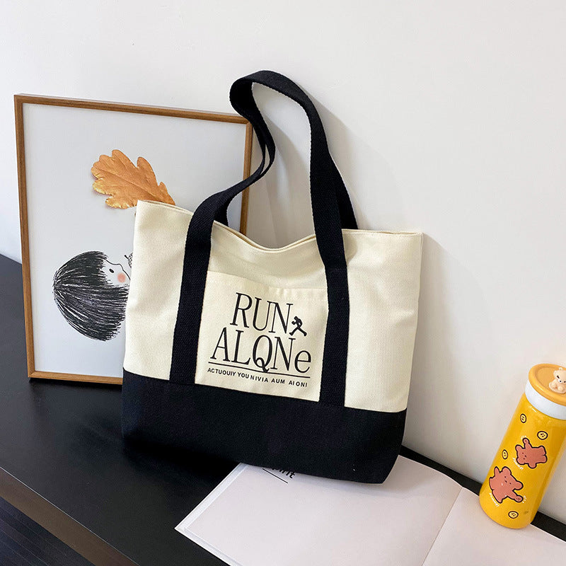 Stylish Canvas Tote Bag for Women - Urban Minimalist Design with Large Capacity and Print Details, Perfect for Daily Use and Shopping