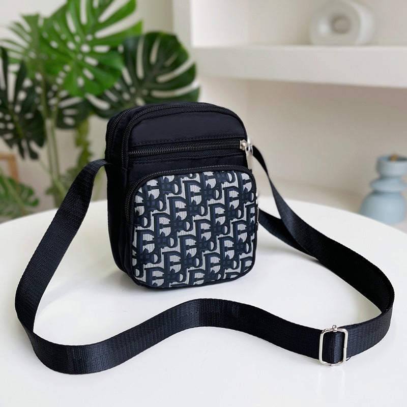 Mini Crossbody Bag with Elephant Print for Women, Lightweight Nylon Phone Pouch with Multiple Pockets and Adjustable Strap