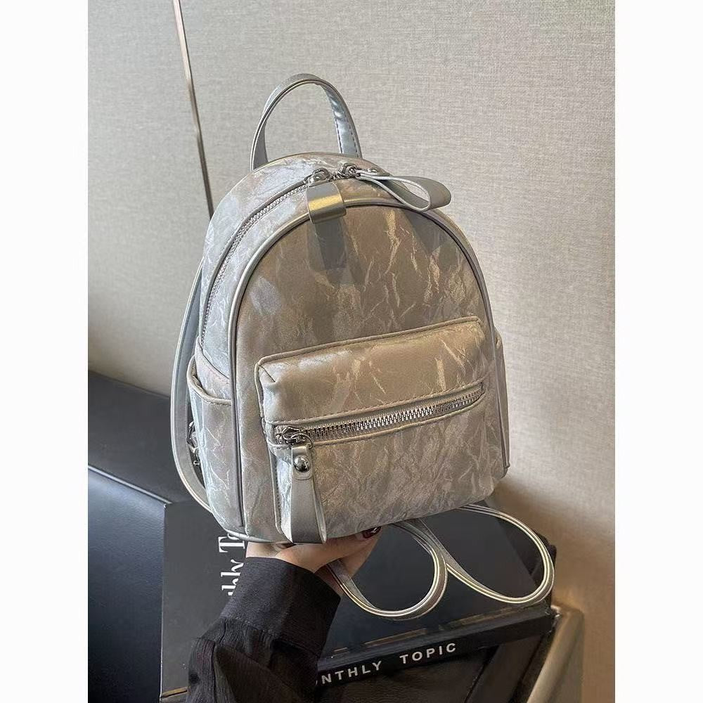 Minimalist PU Backpack for Women - Stylish Daily Commute and Travel Bag with Zippered Pockets and Soft Design