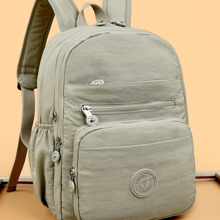 Lightweight Breathable Nylon Backpack for Travel and School, Fashionable Street Style with Multiple Pockets and Zipper Closure