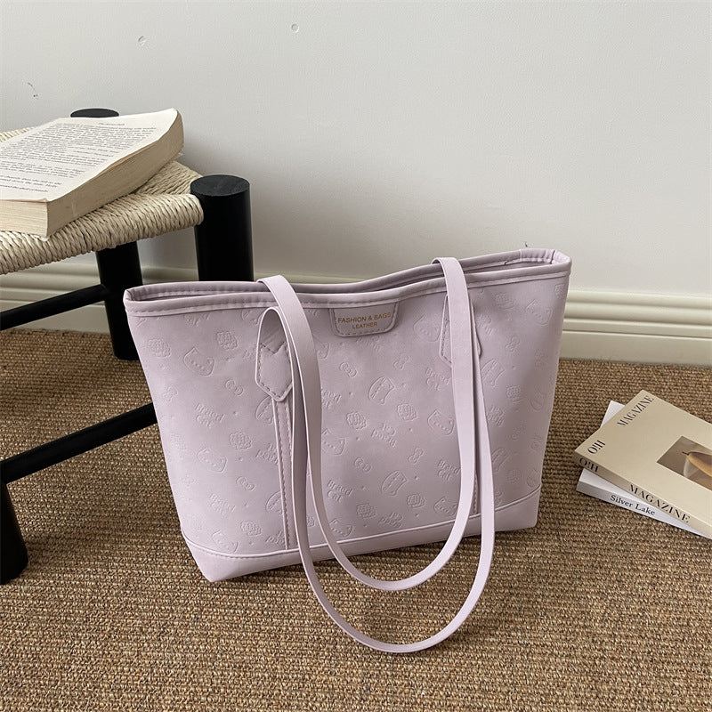 Chic Embossed Tote Bag for Women with Fashionable Monogram Pattern and Spacious Design Perfect for Daily Commute and Casual Outings