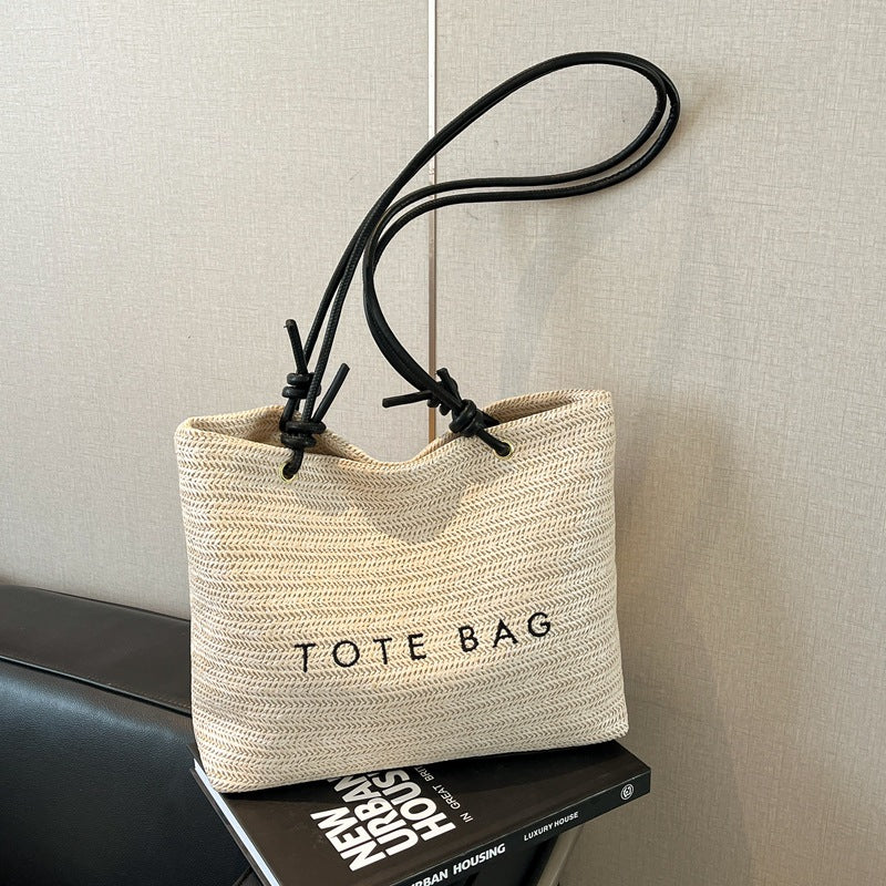 Stylish Straw Tote Bag with Leather Handles for Beach, Travel and Daily Use