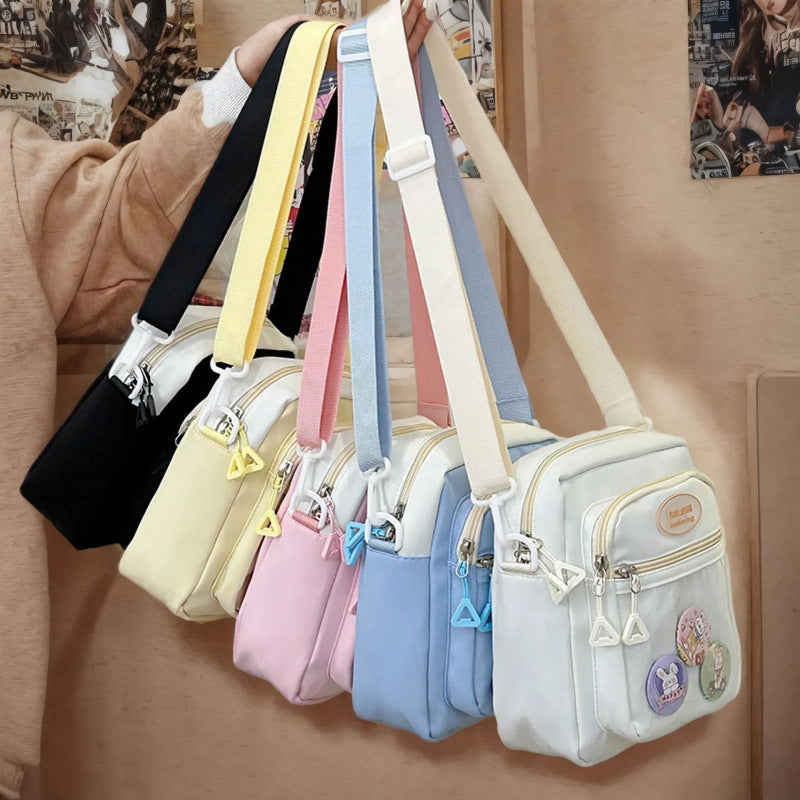 Cute Fashion Crossbody Bag with Multiple Pockets and Cartoon Badges for Daily Use