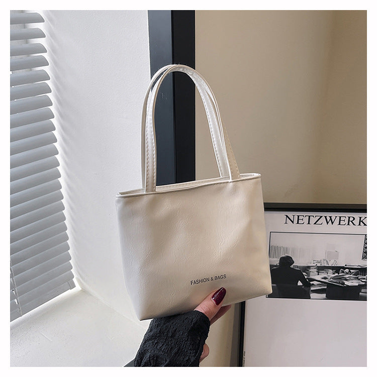 Minimalist Elegant Tote Bag for Women 2025 New Fashion Simple Solid Color Handbag with Magnetic Closure and Stitching Details