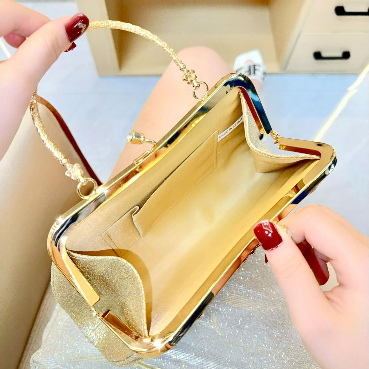 Elegant Pleated Clutch Bag with Rhinestone Closure and Gold Handle for Evening Events