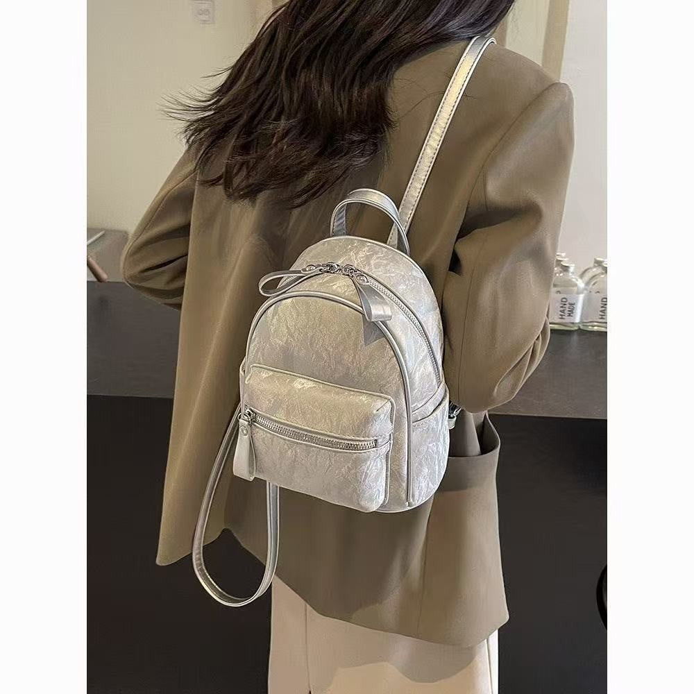 Minimalist PU Backpack for Women - Stylish Daily Commute and Travel Bag with Zippered Pockets and Soft Design