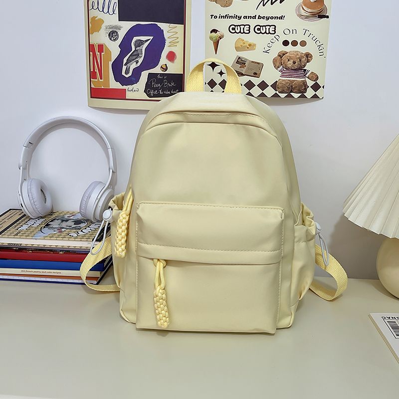 Cute Minimalist Nylon Backpack for Students - Lightweight, Breathable, and Stylish with Braided Drawstring Design