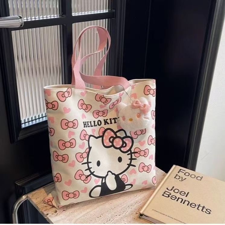 Hello Kitty Canvas Tote Bag with Cute Plush Charm, Large Capacity Shoulder Bag for Women, Perfect for Daily Use and Travel