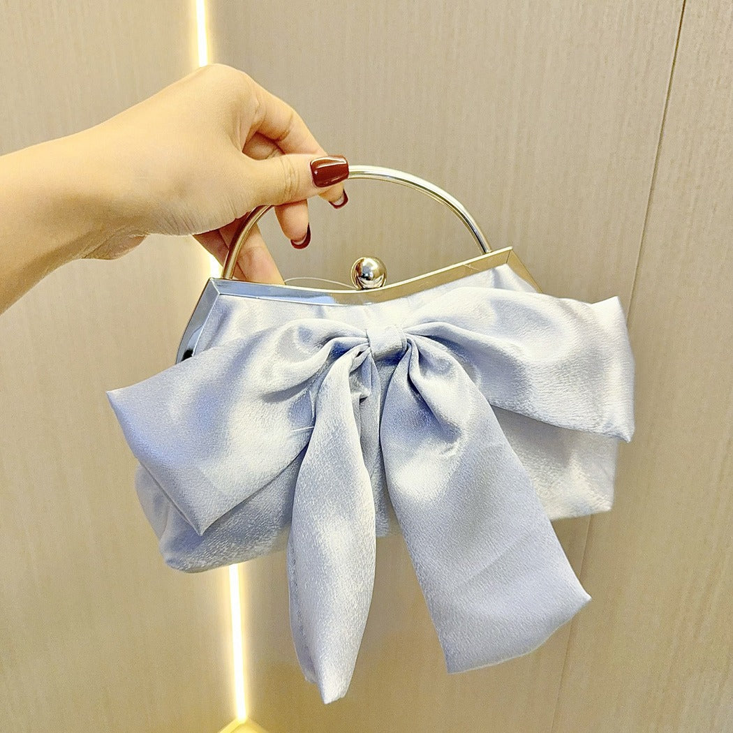 Elegant White Bow Handbag with Metal Handle for Wedding and Evening Events, Soft Satin Design with Inner Pockets