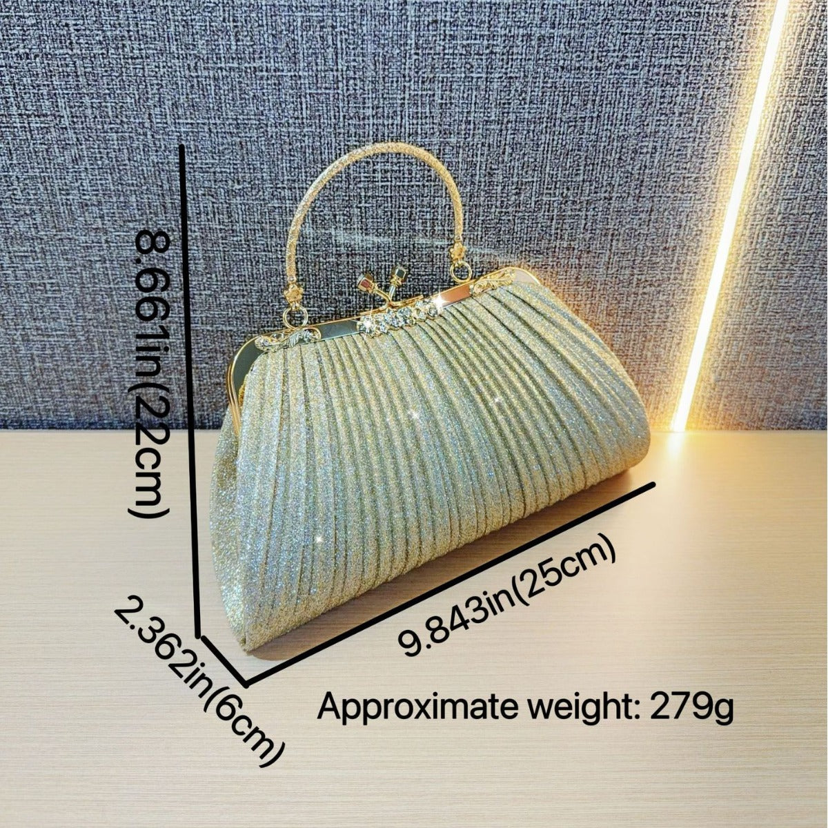 Elegant Pleated Clutch Bag with Rhinestone Closure and Gold Handle for Evening Events