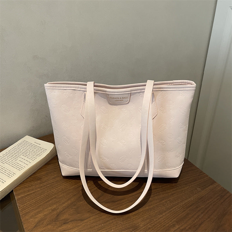 Chic Embossed Tote Bag for Women with Fashionable Monogram Pattern and Spacious Design Perfect for Daily Commute and Casual Outings