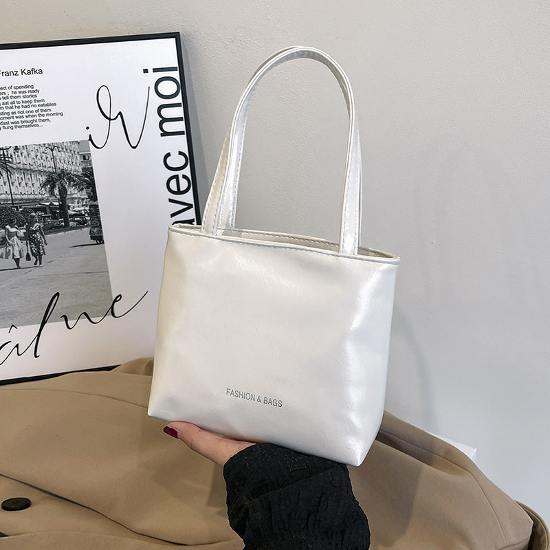 Minimalist Elegant Tote Bag for Women 2025 New Fashion Simple Solid Color Handbag with Magnetic Closure and Stitching Details