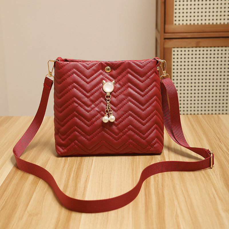 Chic Chevron Quilted Crossbody Bag with Cat Pearl Charm and Magnetic Closure for Daily Fashion
