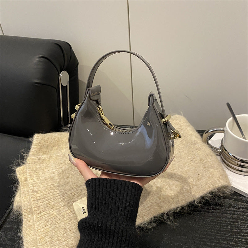 Elegant French-Style Moon Bag with Glossy PU Finish, Fashionable Handheld Design for Daily Chic