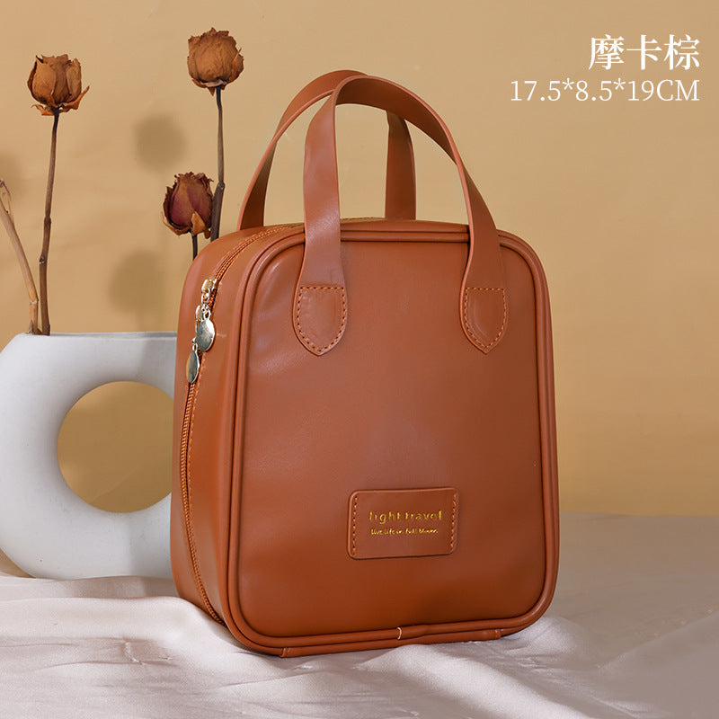 Elegant PU Travel Cosmetic Bag with Large Capacity and Fashionable Design for Makeup and Toiletries Storage