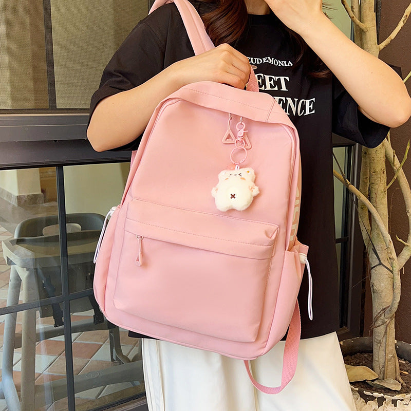 Stylish High-Capacity Backpack for Teen Girls, Japanese Casual Design with Cute Plush Charm and Durable Nylon Material