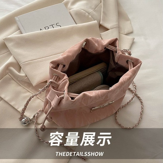 Fashionable Drawstring Bucket Bag with Chain Strap and Cute Pom-Pom Charm for Women