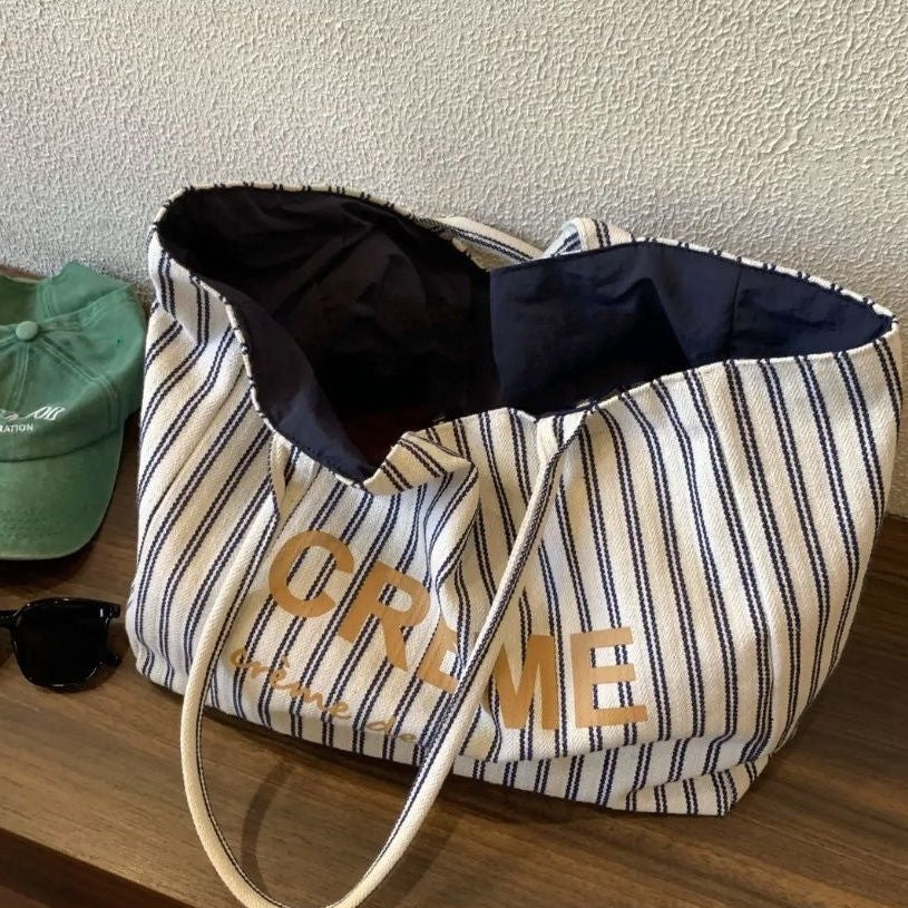 Stylish Striped Tote Bag 2025 Spring Fashion Canvas Shoulder Bag with Gold Lettering and Spacious Design for Daily Use