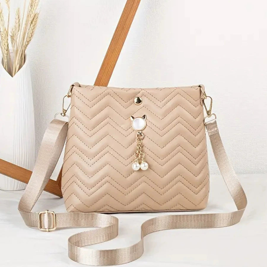 Chic Chevron Quilted Crossbody Bag with Cat Pearl Charm and Magnetic Closure for Daily Fashion