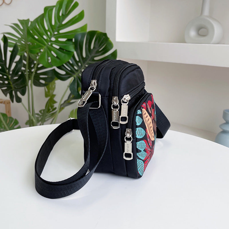 Mini Crossbody Bag with Elephant Print for Women, Lightweight Nylon Phone Pouch with Multiple Pockets and Adjustable Strap
