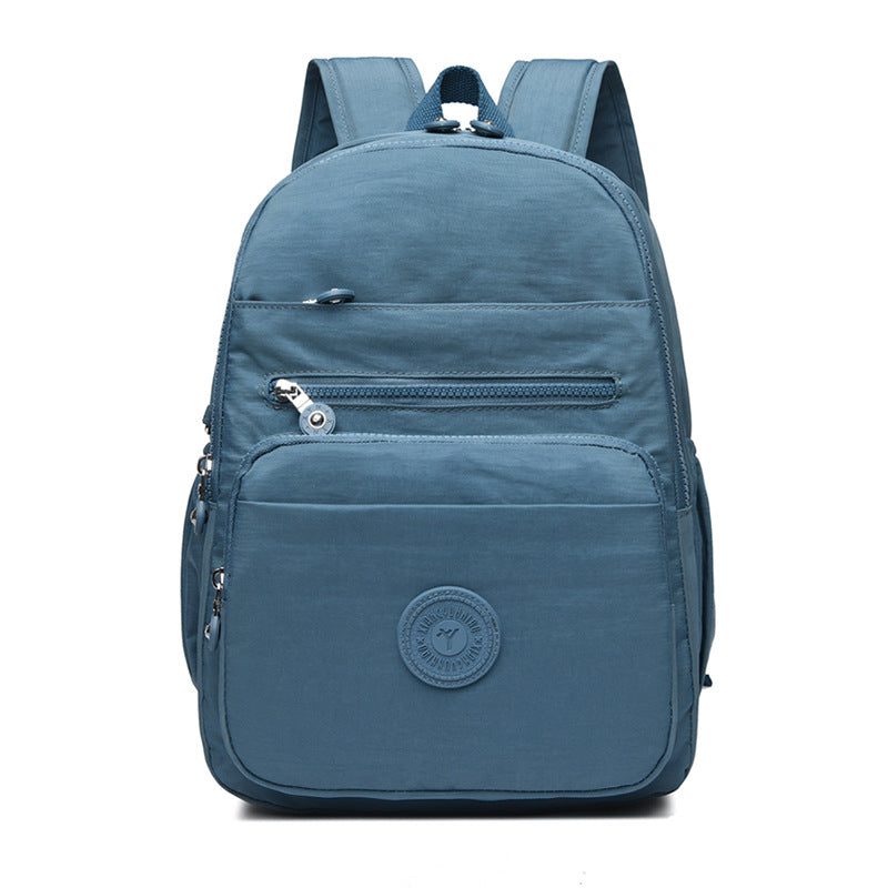 Lightweight Breathable Nylon Backpack for Travel and School, Fashionable Street Style with Multiple Pockets and Zipper Closure