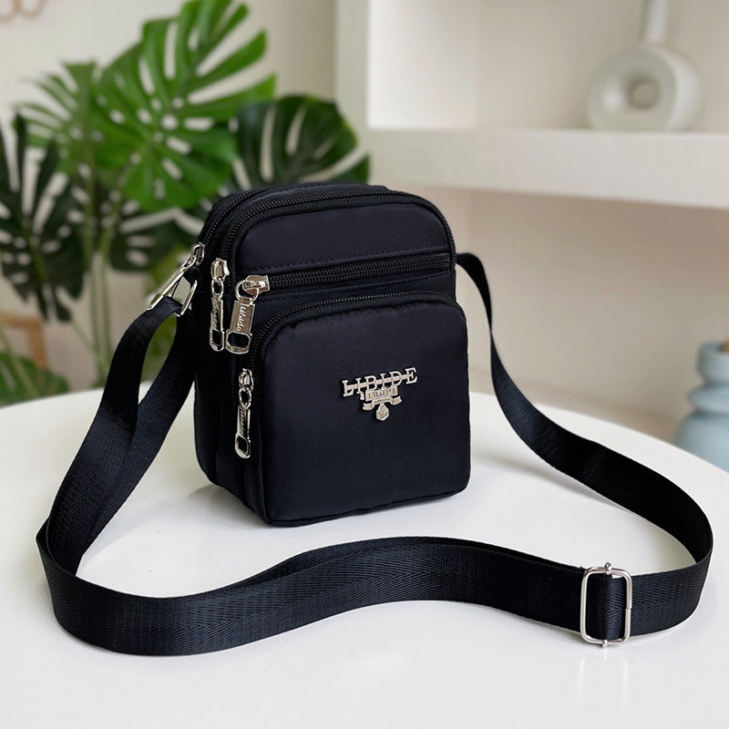 Mini Crossbody Bag with Elephant Print for Women, Lightweight Nylon Phone Pouch with Multiple Pockets and Adjustable Strap