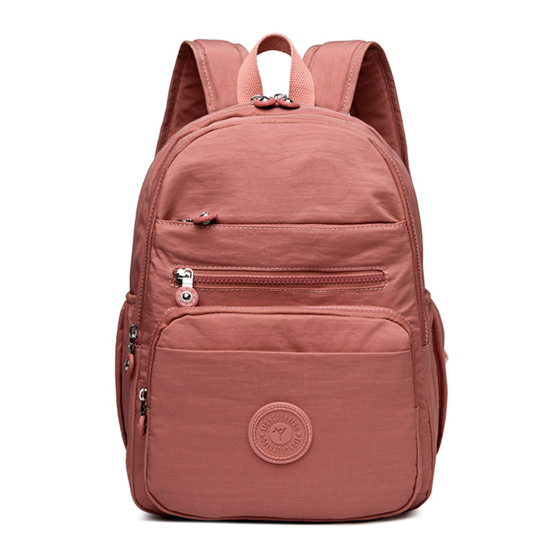 Lightweight Breathable Nylon Backpack for Travel and School, Fashionable Street Style with Multiple Pockets and Zipper Closure