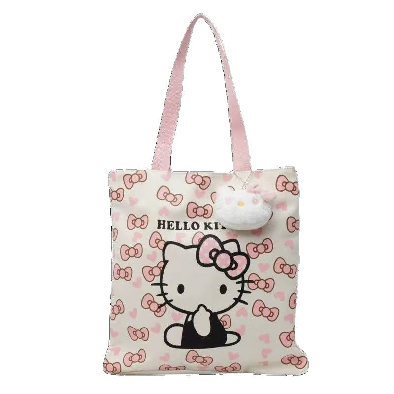 Hello Kitty Canvas Tote Bag with Cute Plush Charm, Large Capacity Shoulder Bag for Women, Perfect for Daily Use and Travel