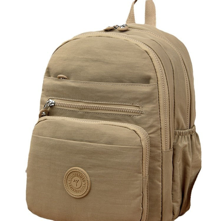 Lightweight Breathable Nylon Backpack for Travel and School, Fashionable Street Style with Multiple Pockets and Zipper Closure