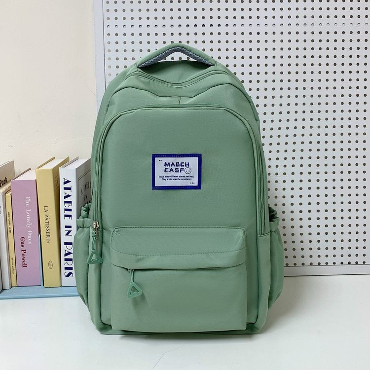 Minimalist High-Capacity Backpack for Students and Daily Use with Fashionable Letter Design