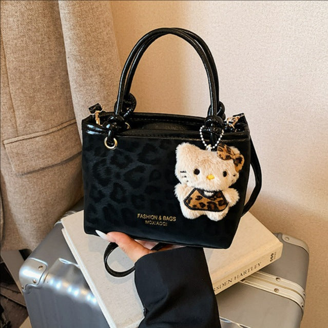Chic Vintage Bucket Bag with Plush Charm for Women, Perfect for Daily Wear and Fashionable Outfits