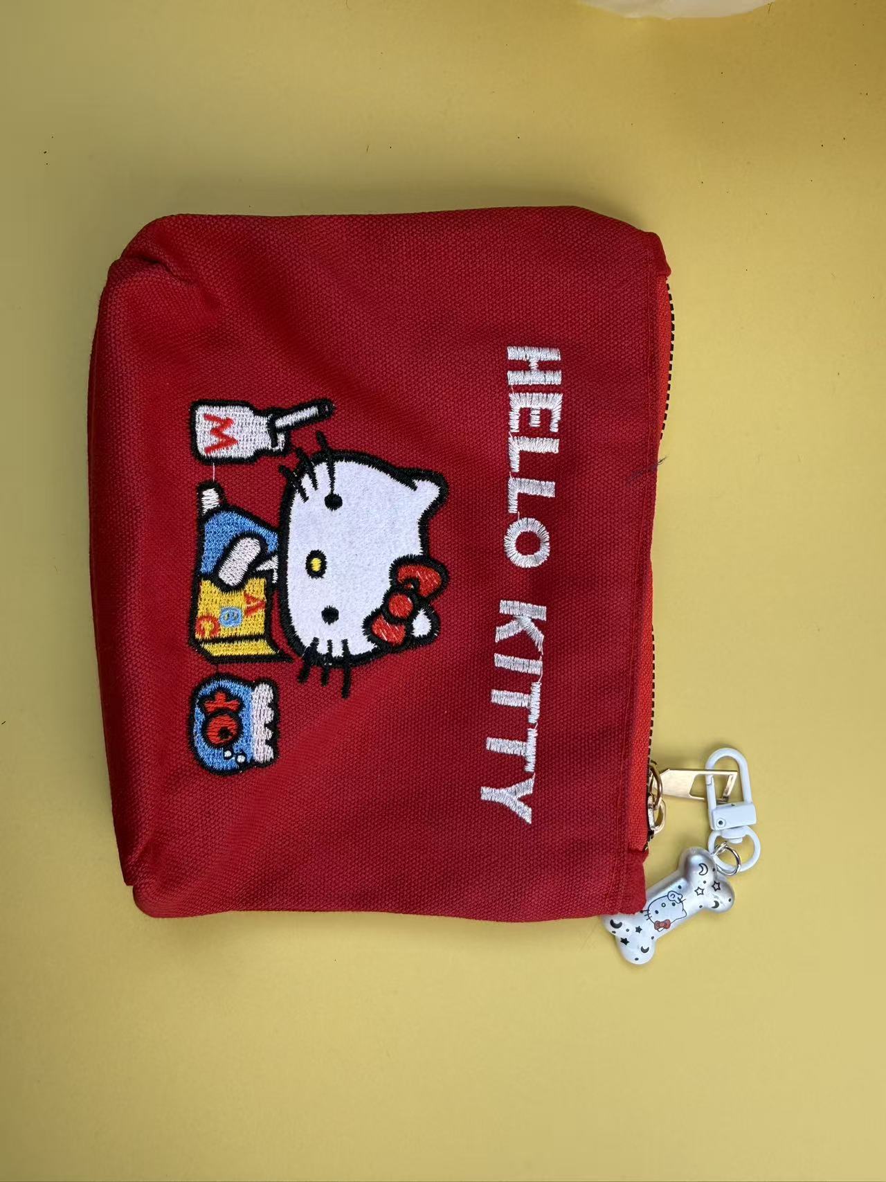 Sanrio Cat Embroidered Canvas Women's Storage Bag with Bones Pendant Zipper Cute Cartoon Design Daily Practical