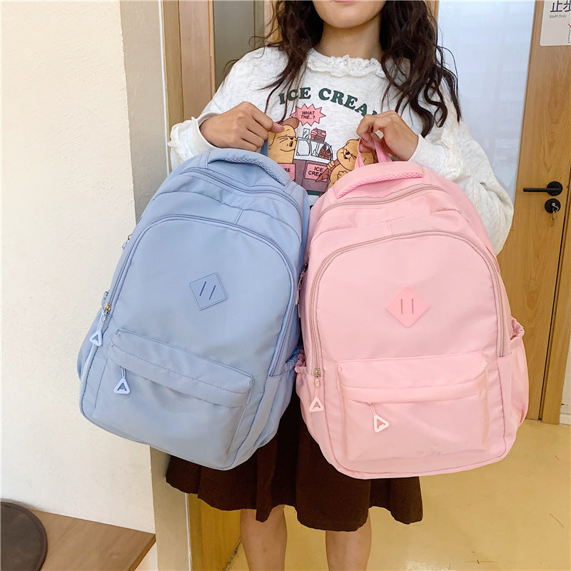 New Simple Color Backpack with Large Capacity, Lightweight and Stylish for Students and Travel