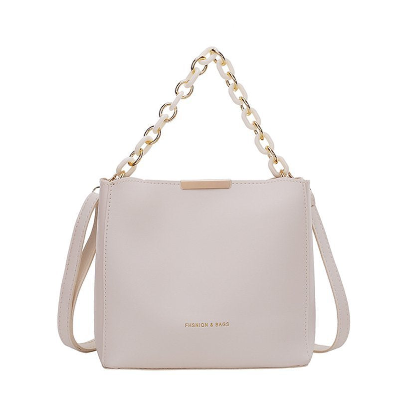 Chic Urban Mini Bucket Bag with Chain Strap and Zip Closure for Everyday Style