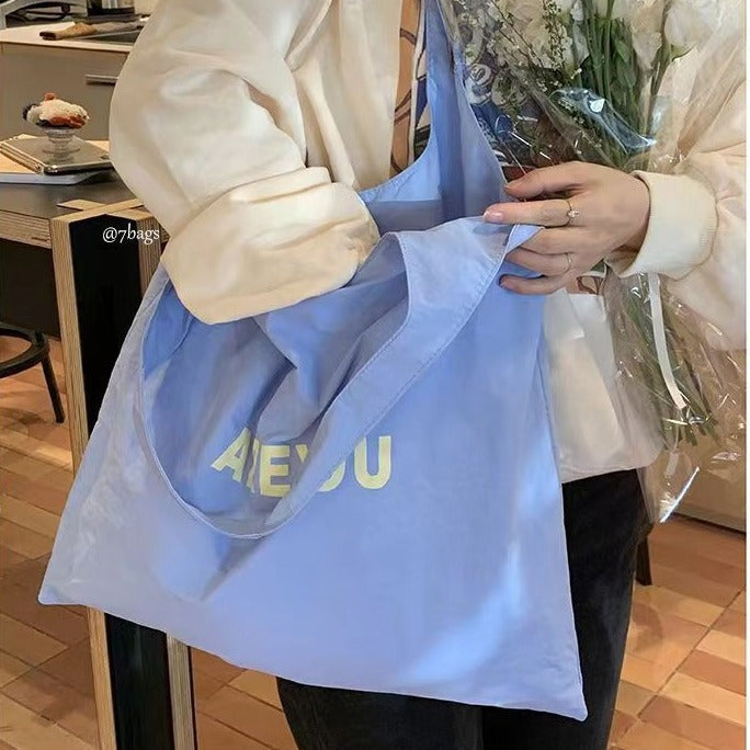 Minimalist Canvas Tote Bag with Letter Print, Large Capacity Shoulder Bag for Daily Use, Fashionable and Versatile Design