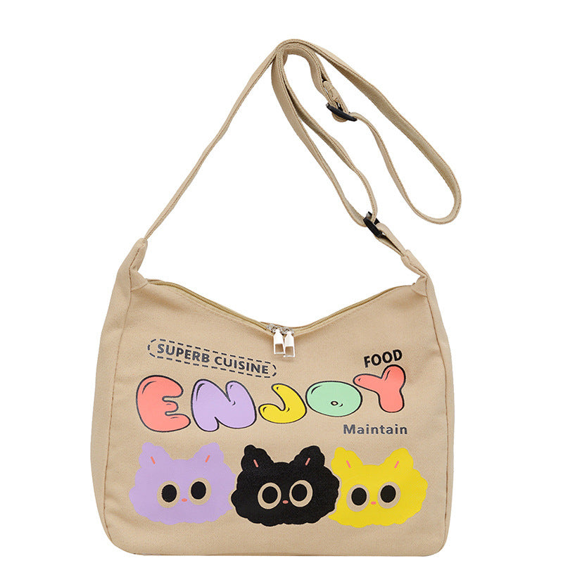 Cute Cartoon Cat Print Canvas Tote Bag with Colorful 'ENJOY' Lettering and Zipper Closure for Daily Use