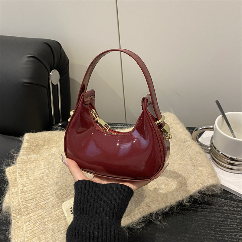 Elegant French-Style Moon Bag with Glossy PU Finish, Fashionable Handheld Design for Daily Chic