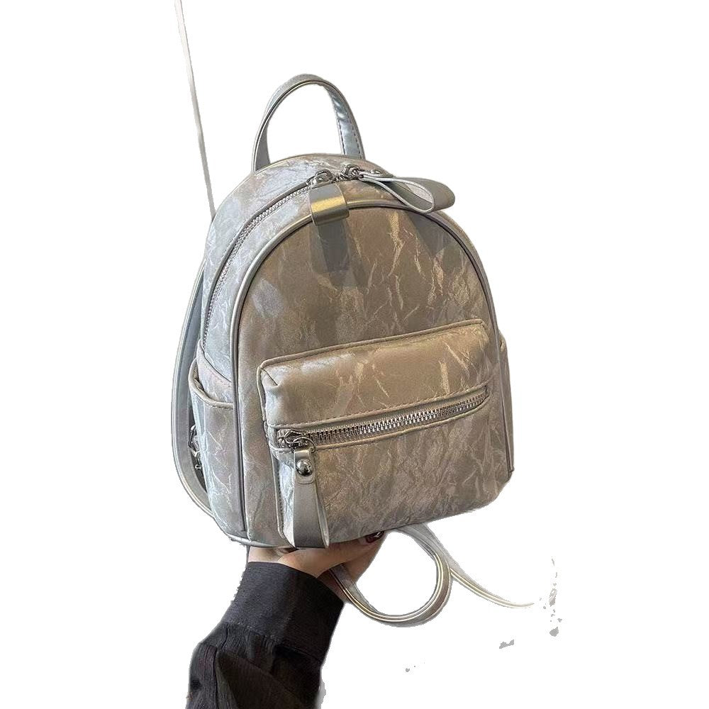 Minimalist PU Backpack for Women - Stylish Daily Commute and Travel Bag with Zippered Pockets and Soft Design