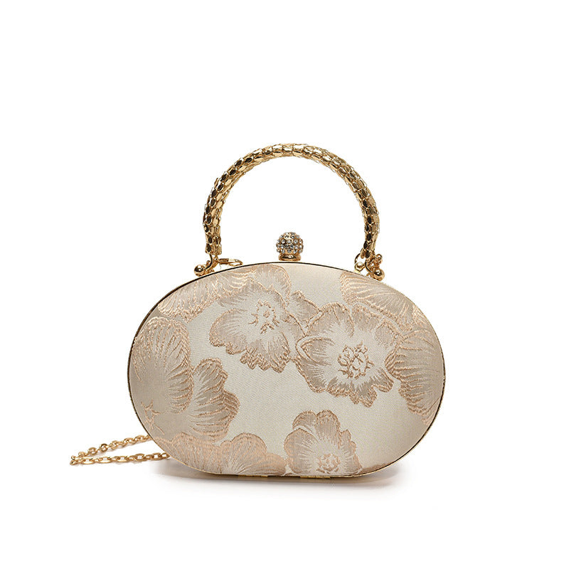 Elegant Embroidered Oval Handbag with Golden Chain Strap for Evening and Daily Use