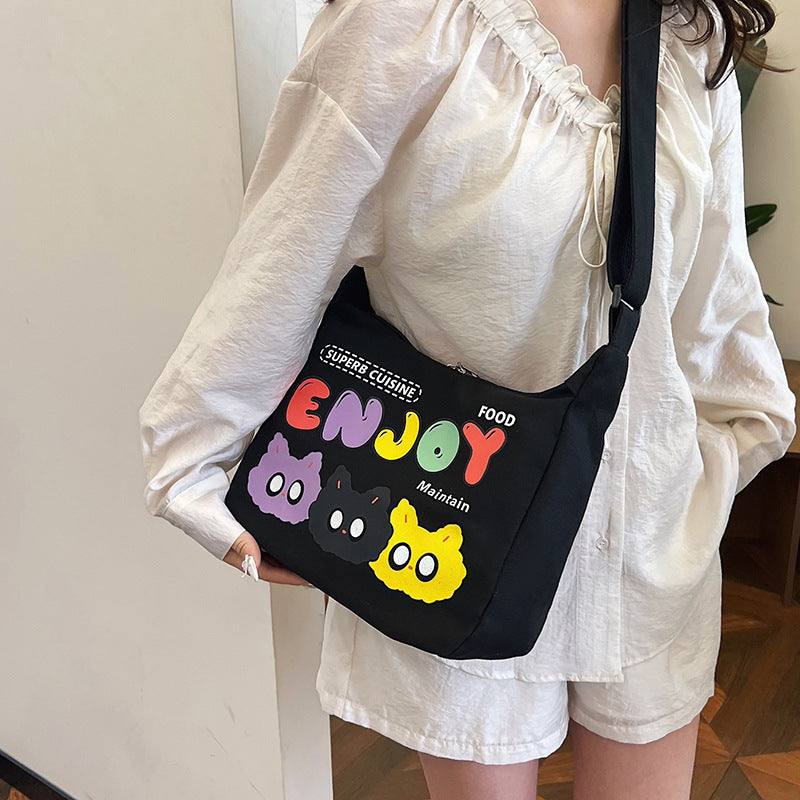 Cute Cartoon Cat Print Canvas Tote Bag with Colorful 'ENJOY' Lettering and Zipper Closure for Daily Use